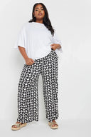 מכנסיים במידות גדולות גומי במותן גזרה רחבה דוגמת לבבות עם כיסים 303492