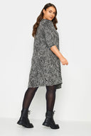 שמלה במידות גדולות דוגמת זברה שרוול 3/4 עם כיסים 302869