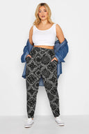 מכנס במידות גדולות מכפלת צרה עם הדפס עם כיסים גזרת גזר 143292