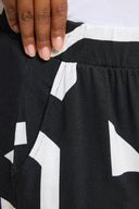 מכנסיים במידות גדולות גומי במותן דוגמת אבסטרקט רחבות עם שתי כיסים קדמיים 304089