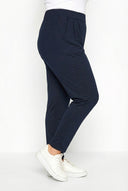 מכנסיים צמודים במידות גדולות עם כיסים גומי במותן לייקרה קרסול צר 103368