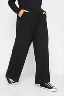 מכנסיים במידות גדולות פרטי קפלים גומי במותן עם כיסים רגל רחבה 213839