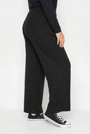 מכנסיים במידות גדולות פרטי קפלים גומי במותן עם כיסים רגל רחבה 213839