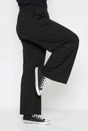 מכנסיים במידות גדולות פרטי קפלים גומי במותן עם כיסים רגל רחבה 213839